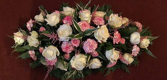 Funeral flowers - pink carnation spray
